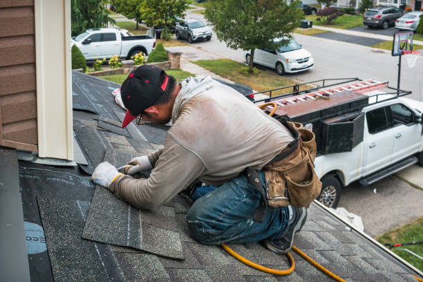 Professional Roofing technician working in Melrose Park, NY